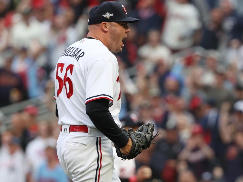 Oct 4, 2023; Minneapolis, Minnesota, USA; Minnesota Twins relief pitcher Caleb Thielbar (56) celebrates double play in the sixth inning against the Toronto Blue Jays  during game two of the Wildcard series for the 2023 MLB playoffs at Target Field. Mandatory Credit: Jesse Johnson-USA TODAY Sports