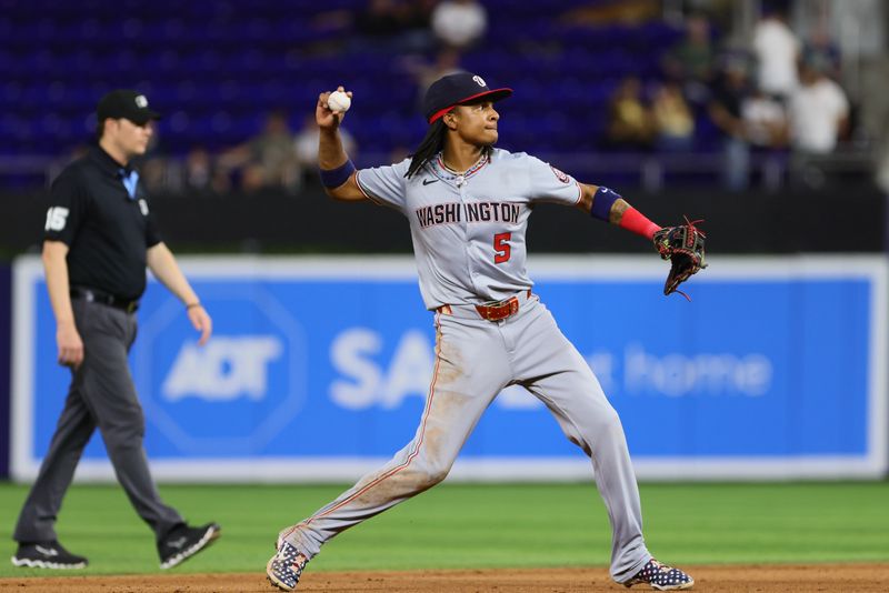 Apr 29, 2024; Miami, Florida, USA; Washington Nationals shortstop CJ Abrams (5) throws to first base to retire Miami Marlins third baseman Emmanuel Rivera (not pictured) during the seventh inning at loanDepot Park. Mandatory Credit: Sam Navarro-USA TODAY Sports