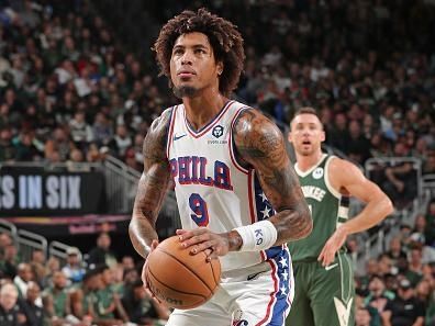 MILWAUKEE, WI - OCTOBER 26: Kelly Oubre Jr. #9 of the Philadelphia 76ers shoots a free throw during the game against the Milwaukee Bucks on October 26, 2023 at the Fiserv Forum Center in Milwaukee, Wisconsin. NOTE TO USER: User expressly acknowledges and agrees that, by downloading and or using this Photograph, user is consenting to the terms and conditions of the Getty Images License Agreement. Mandatory Copyright Notice: Copyright 2023 NBAE (Photo by Gary Dineen/NBAE via Getty Images).