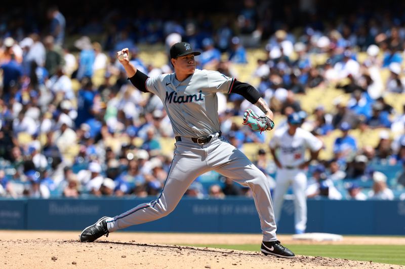 May 8, 2024; Los Angeles, California, USA;  Miami Marlins pitcher Anthony Maldonado (52) pitches during the seventh inning against the Los Angeles Dodgers at Dodger Stadium. Mandatory Credit: Kiyoshi Mio-USA TODAY Sports