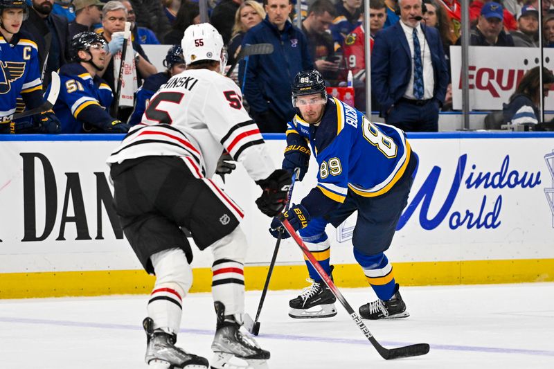 Apr 10, 2024; St. Louis, Missouri, USA;  St. Louis Blues left wing Pavel Buchnevich (89) controls the puck against the Chicago Blackhawks during the second period at Enterprise Center. Mandatory Credit: Jeff Curry-USA TODAY Sports