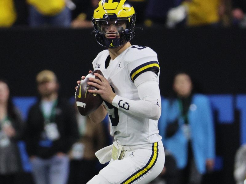 Dec 2, 2023; Indianapolis, IN, USA; Michigan Wolverines quarterback J.J. McCarthy (9) drops to throw during the first half of the Big Ten Championship game against the Iowa Hawkeyes at Lucas Oil Stadium. Mandatory Credit: Trevor Ruszkowski-USA TODAY Sports