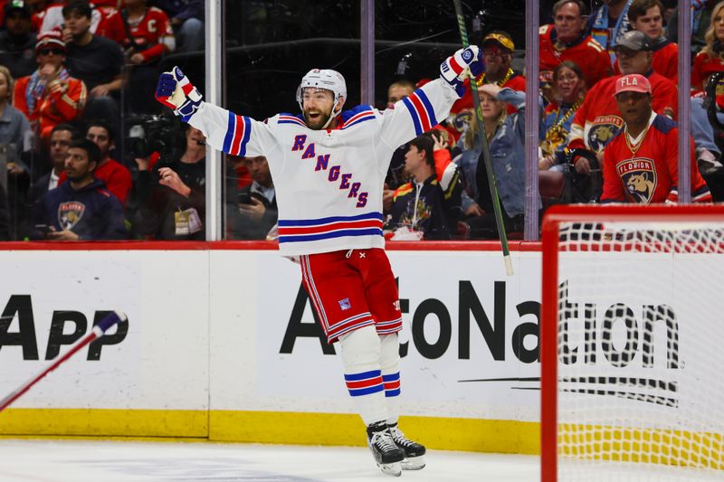 May 26, 2024; Sunrise, Florida, USA; New York Rangers center Barclay Goodrow (21) celebrates after scoring against the Florida Panthers during the second period in game three of the Eastern Conference Final of the 2024 Stanley Cup Playoffs at Amerant Bank Arena. Mandatory Credit: Sam Navarro-USA TODAY Sports