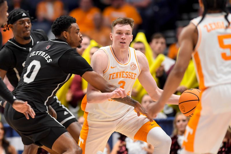 Mar 15, 2024; Nashville, TN, USA; Mississippi State Bulldogs forward D.J. Jeffries (0) guards Tennessee Volunteers guard Dalton Knecht (3) during the first half at Bridgestone Arena. Mandatory Credit: Steve Roberts-USA TODAY Sports