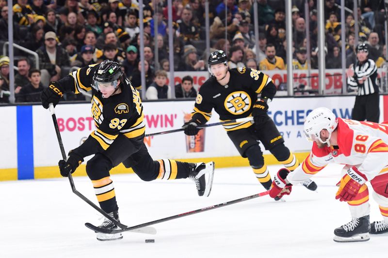 Jan 8, 2026; Boston, Massachusetts, USA; Boston Bruins center Fraser Minten (93) breaks his stick while Calgary Flames left wing Joel Farabee (86) defends during the third period at TD Garden. Mandatory Credit: Bob DeChiara-Imagn Images