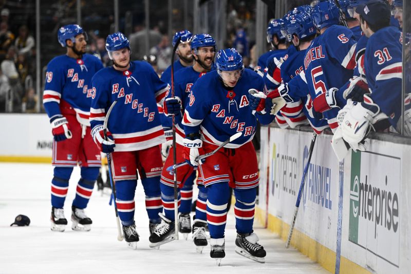 Mar 21, 2024; Boston, Massachusetts, USA; New York Rangers left wing Artemi Panarin (10) celebrates with his teammates after scoring a goal against the Boston Bruins during the third period at the TD Garden. Mandatory Credit: Brian Fluharty-USA TODAY Sports