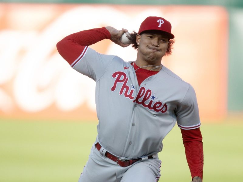 Jun 16, 2023; Oakland, California, USA; Philadelphia Phillies starting pitcher Taijuan Walker (99) pitches against the Oakland Athletics during the first inning at Oakland-Alameda County Coliseum. Mandatory Credit: D. Ross Cameron-USA TODAY Sports