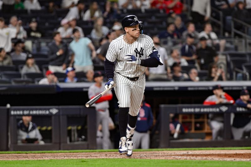 Jun 8, 2025; Bronx, New York, USA; New York Yankees outfielder Aaron Judge (99) hits a two-run home run against the Boston Red Sox during the ninth inning at Yankee Stadium. Mandatory Credit: John Jones-Imagn Images