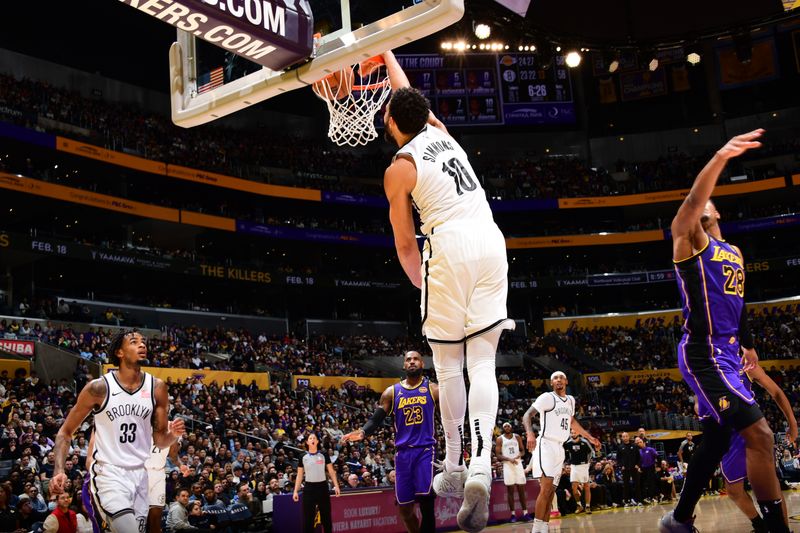 LOS ANGELES, CA - JANUARY 17: Ben Simmons #10 of the Brooklyn Nets dunks the ball during the game against the Los Angeles Lakers on January 17, 2025 at Crypto.Com Arena in Los Angeles, California. NOTE TO USER: User expressly acknowledges and agrees that, by downloading and/or using this Photograph, user is consenting to the terms and conditions of the Getty Images License Agreement. Mandatory Copyright Notice: Copyright 2025 NBAE (Photo by Adam Pantozzi/NBAE via Getty Images)