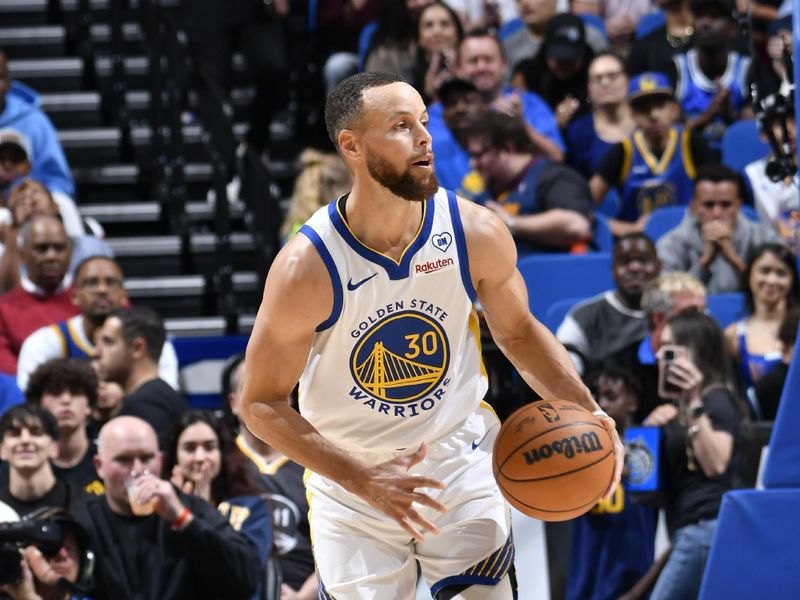 ORLANDO, FL - MARCH 27: Stephen Curry #30 of the Golden State Warriors handles the ball during the game against the Orlando Magic on March 27, 2024 at Amway Center in Orlando, Florida. NOTE TO USER: User expressly acknowledges and agrees that, by downloading and or using this photograph, User is consenting to the terms and conditions of the Getty Images License Agreement. Mandatory Copyright Notice: Copyright 2024 NBAE (Photo by Fernando Medina/NBAE via Getty Images)