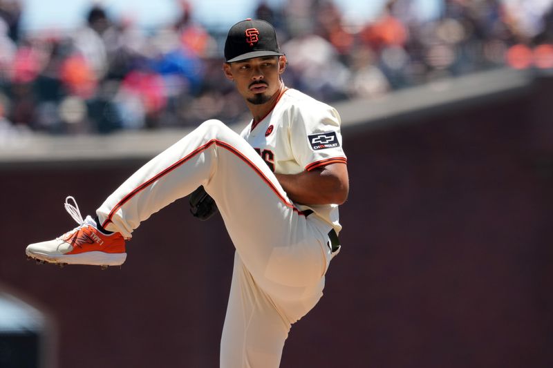 Jun 27, 2024; San Francisco, California, USA; San Francisco Giants starting pitcher Jordan Hicks (12) throws a pitch against the Chicago Cubs during the first inning at Oracle Park. Mandatory Credit: Darren Yamashita-USA TODAY Sports
