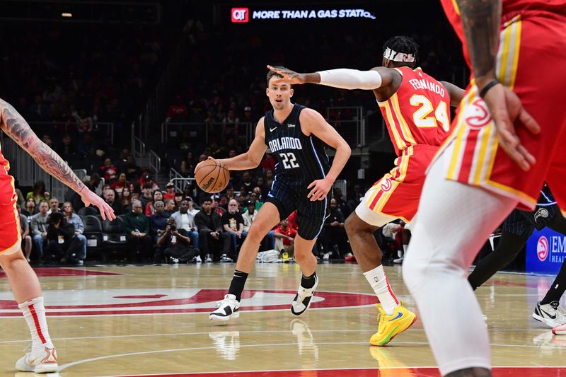 ATLANTA, GA - FEBRUARY 25: Franz Wagner #22 of the Orlando Magic dribbles the ball during the game against the Atlanta Hawks on February 25, 2024 at State Farm Arena in Atlanta, Georgia.  NOTE TO USER: User expressly acknowledges and agrees that, by downloading and/or using this Photograph, user is consenting to the terms and conditions of the Getty Images License Agreement. Mandatory Copyright Notice: Copyright 2024 NBAE (Photo by Scott Cunningham/NBAE via Getty Images)