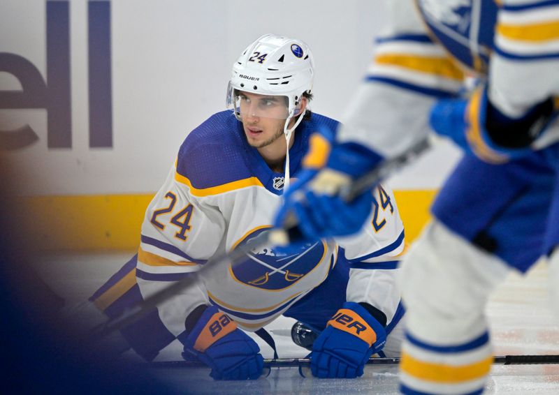 Feb 21, 2024; Montreal, Quebec, CAN; Buffalo Sabres forward Dylan Cozens (24) stretches during the warmup period before the game against the Montreal Canadiens at the Bell Centre. Mandatory Credit: Eric Bolte-USA TODAY Sports