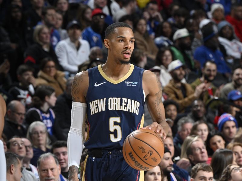 PHILADELPHIA, PA - JANUARY 10: Dejounte Murray #5 of the New Orleans Pelicans dribbles the ball during the game against the Philadelphia 76ers on January 10, 2025 at the Wells Fargo Center in Philadelphia, Pennsylvania NOTE TO USER: User expressly acknowledges and agrees that, by downloading and/or using this Photograph, user is consenting to the terms and conditions of the Getty Images License Agreement. Mandatory Copyright Notice: Copyright 2025 NBAE (Photo by David Dow/NBAE via Getty Images)