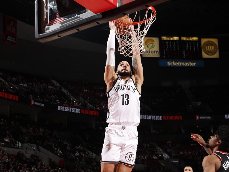 PORTLAND, OR - JANUARY 14: Tyrese Martin #13 of the Brooklyn Nets dunks the ball during the game against the Portland Trail Blazers on January 14, 2025 at the Moda Center Arena in Portland, Oregon. NOTE TO USER: User expressly acknowledges and agrees that, by downloading and or using this photograph, user is consenting to the terms and conditions of the Getty Images License Agreement. Mandatory Copyright Notice: Copyright 2025 NBAE (Photo by Cameron Browne/NBAE via Getty Images)