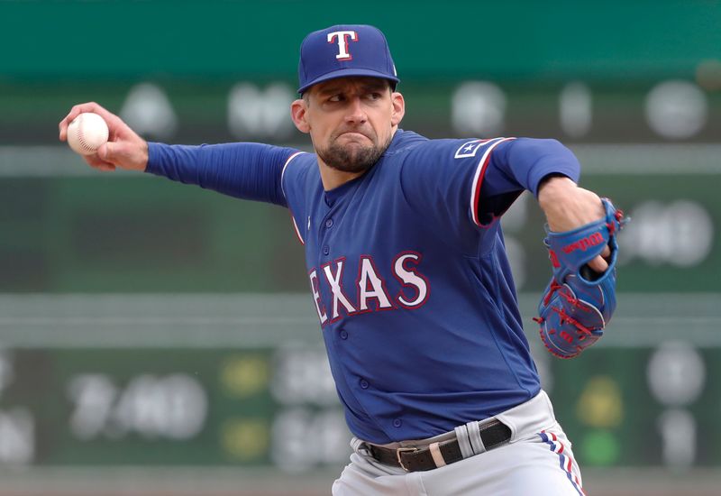 May 23, 2023; Pittsburgh, Pennsylvania, USA; Texas Rangers starting pitcher Nathan Eovaldi (17) delivers a pitch  against the Pittsburgh Pirates during the first inning at PNC Park. Mandatory Credit: Charles LeClaire-USA TODAY Sports