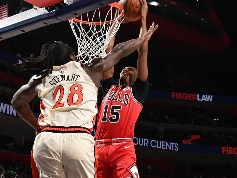 DETROIT, MI - NOVEMBER 18: Julian Phillips #15 of the Chicago Bulls dunks the ball during the game against the Detroit Pistons on November 18, 2024 at Little Caesars Arena in Detroit, Michigan. NOTE TO USER: User expressly acknowledges and agrees that, by downloading and/or using this photograph, User is consenting to the terms and conditions of the Getty Images License Agreement. Mandatory Copyright Notice: Copyright 2024 NBAE (Photo by Chris Schwegler/NBAE via Getty Images)