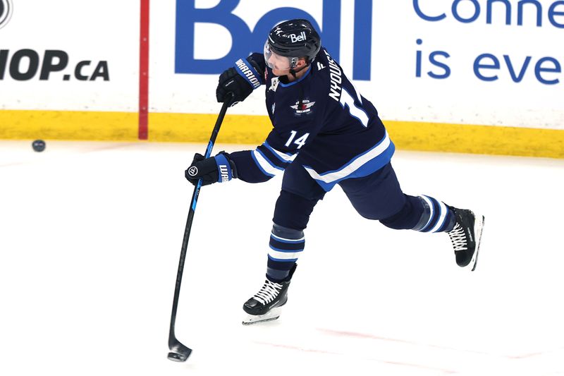 Feb 4, 2026; Winnipeg, Manitoba, CAN; Winnipeg Jets right wing Gustav Nyquist (14) warms up before a game against the Montreal Canadiens at Canada Life Centre. Mandatory Credit: James Carey Lauder-Imagn Images