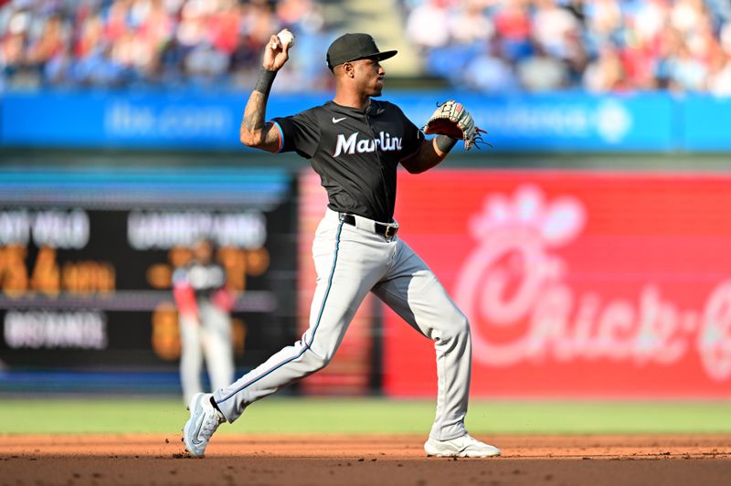 Jun 27, 2024; Philadelphia, Pennsylvania, USA; Miami Marlins infielder Tim Anderson (7) throws to first against the Philadelphia Phillies in the first inning at Citizens Bank Park. Mandatory Credit: Kyle Ross-USA TODAY Sports