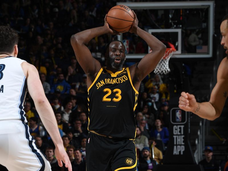 SAN FRANCISCO, CA - MARCH 20: Draymond Green #23 of the Golden State Warriors looks to pass the ball during the game against the Memphis Grizzlies on March 20, 2024 at Chase Center in San Francisco, California. NOTE TO USER: User expressly acknowledges and agrees that, by downloading and or using this photograph, user is consenting to the terms and conditions of Getty Images License Agreement. Mandatory Copyright Notice: Copyright 2024 NBAE (Photo by Noah Graham/NBAE via Getty Images)