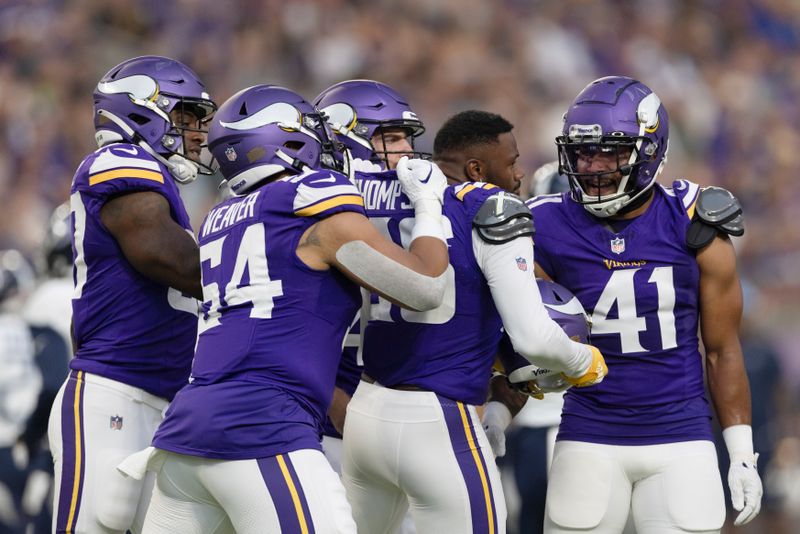Minnesota Vikings cornerback NaJee Thompson (36) celebrates with teammates after a play during an NFL preseason football game against the Tennessee Titans, Saturday, Aug. 19, 2023 in Minneapolis. Tennessee won 24-16. (AP Photo/Stacy Bengs)