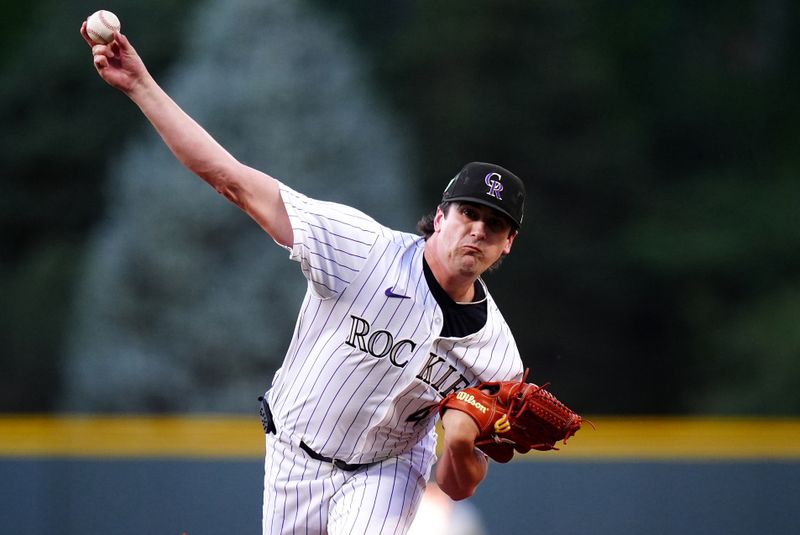 Aug 16, 2024; Denver, Colorado, USA; Colorado Rockies starting pitcher Cal Quantrill (47) delivers a pitch in the first inning against the San Diego Padres at Coors Field. Mandatory Credit: Ron Chenoy-USA TODAY Sports