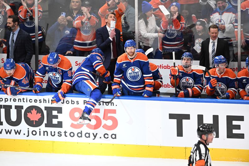 Dec 31, 2024; Edmonton, Alberta, CAN; Edmonton Oilers head coach Kris Knoblauch is seen seen on the players bench during the third period at Rogers Place. Mandatory Credit: Walter Tychnowicz-Imagn Images