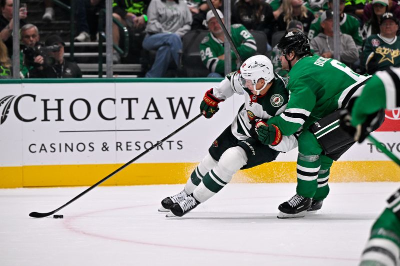 Oct 14, 2025; Dallas, Texas, USA; Dallas Stars defenseman Lian Bichsel (6) takes down Minnesota Wild left wing Matt Boldy (12) during the third period at the American Airlines Center. Mandatory Credit: Jerome Miron-Imagn Images