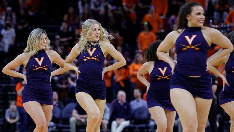 Mar 4, 2023; Charlottesville, Virginia, USA; Members of the Virginia Cavaliers Dance Team dance during a timeout against the Louisville Cardinals in the second half at John Paul Jones Arena. Mandatory Credit: Geoff Burke-USA TODAY Sports