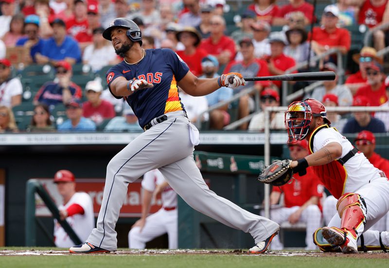 Mar 7, 2024; Jupiter, Florida, USA; Houston Astros first baseman Jose Abreu (79) follows through on his RBI double against the St. Louis Cardinals in the first inning at Roger Dean Chevrolet Stadium. Mandatory Credit: Rhona Wise-USA TODAY Sports