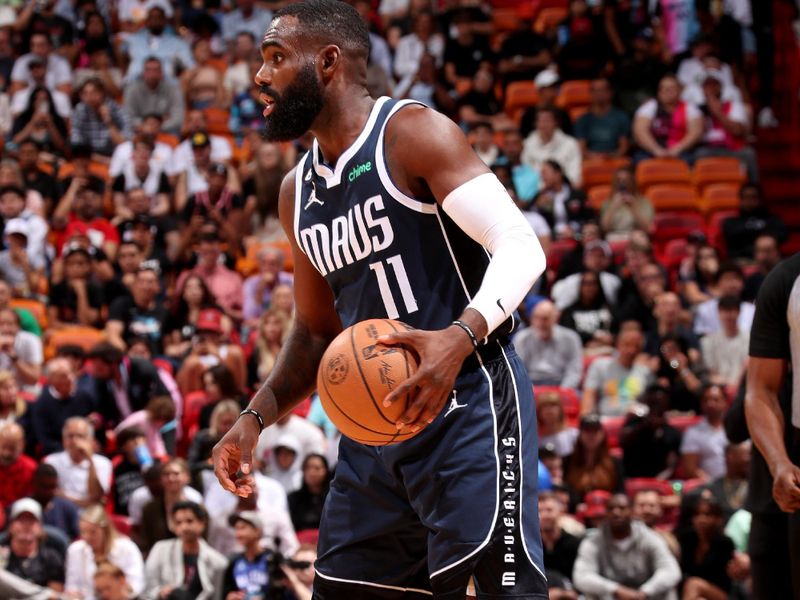 MIAMI, FL - APRIL 1: Tim Hardaway Jr. #11 of the Dallas Mavericks handles the ball during the game against the Miami Heat  on April 1, 2023 at Miami-Dade Arena in Miami, Florida. NOTE TO USER: User expressly acknowledges and agrees that, by downloading and or using this Photograph, user is consenting to the terms and conditions of the Getty Images License Agreement. Mandatory Copyright Notice: Copyright 2023 NBAE (Photo by Issac Baldizon/NBAE via Getty Images)