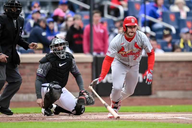 Apr 27, 2024; New York City, New York, USA; St. Louis Cardinals outfielder Brendan Donovan (33) hits a double against the New York Mets during the first inning at Citi Field. Mandatory Credit: John Jones-USA TODAY Sports