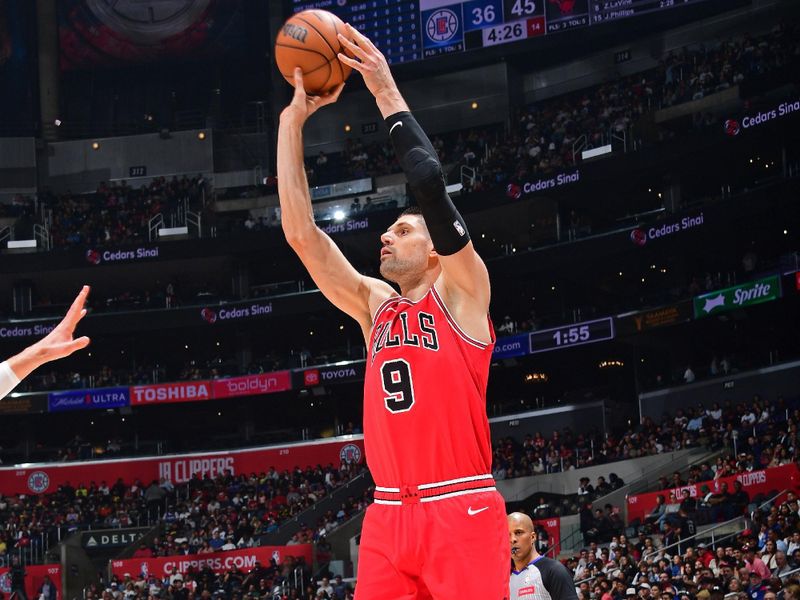 LOS ANGELES, CA - MARCH 9: Nikola Vucevic #9 of the Chicago Bulls shoots the ball during the game against the LA Clippers on March 9, 2024 at Crypto.Com Arena in Los Angeles, California. NOTE TO USER: User expressly acknowledges and agrees that, by downloading and/or using this Photograph, user is consenting to the terms and conditions of the Getty Images License Agreement. Mandatory Copyright Notice: Copyright 2024 NBAE (Photo by Adam Pantozzi/NBAE via Getty Images)