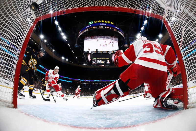 Nov 29, 2025; Boston, Massachusetts, USA; A shot by Boston Bruins center Morgan Geekie (39) scores on Detroit Red Wings goaltender Cam Talbot (39) during the third period at TD Garden. Mandatory Credit: Winslow Townson-Imagn Images