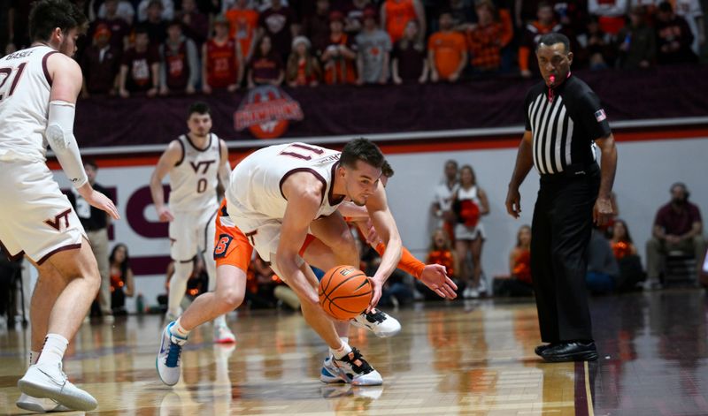 Jan 28, 2023; Blacksburg, Virginia, USA; Virginia Tech Hokies forward John Camden (11) chases after the ball in the second half against the Syracuse Orange at Cassell Coliseum. Mandatory Credit: Lee Luther Jr.-USA TODAY Sports