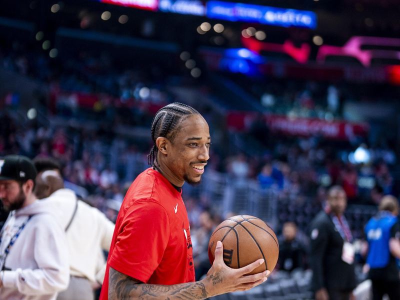 LOS ANGELES, CA - MARCH 27:  DeMar DeRozan #11 of the Chicago Bulls looks on before the game on March 27, 2023 at Crypto.Com Arena in Los Angeles, California. NOTE TO USER: User expressly acknowledges and agrees that, by downloading and/or using this Photograph, user is consenting to the terms and conditions of the Getty Images License Agreement. Mandatory Copyright Notice: Copyright 2023 NBAE (Photo by Tyler Ross/NBAE via Getty Images)