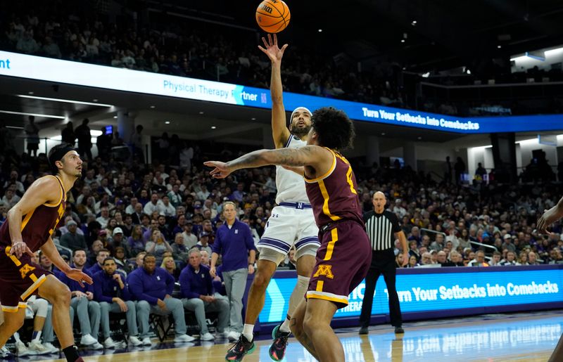 Mar 9, 2024; Evanston, Illinois, USA; Northwestern Wildcats guard Boo Buie (0) shoots over Minnesota Golden Gophers guard Braeden Carrington (4) during the second half at Welsh-Ryan Arena. Mandatory Credit: David Banks-USA TODAY Sports