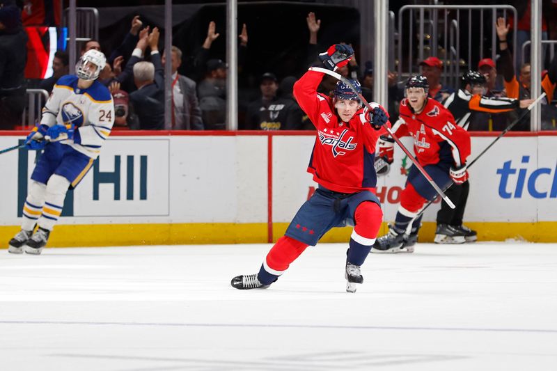 Nov 22, 2023; Washington, District of Columbia, USA; Washington Capitals center Dylan Strome (17) celebrates after scoring the game winning goal in overtime against the Buffalo Sabres at Capital One Arena. Mandatory Credit: Geoff Burke-USA TODAY Sports