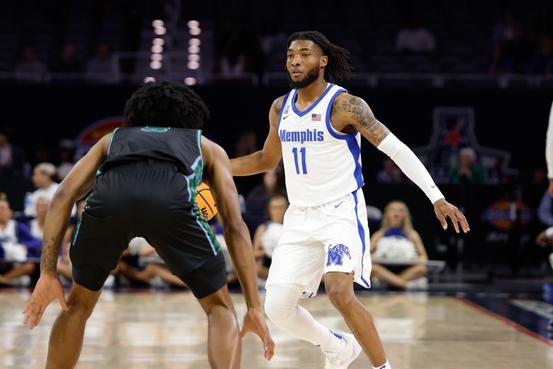 Mar 15, 2025; Fort Worth, TX, USA;Memphis Tigers guard Tyrese Hunter (11) control the ball asTulane Green Wave guard Mari Jordan (5) defends during the first half at Dickies Arena. Mandatory Credit: Chris Jones-Imagn Images