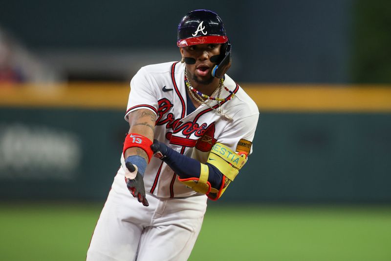 Sep 26, 2023; Atlanta, Georgia, USA; Atlanta Braves right fielder Ronald Acuna Jr. (13) reacts after a home run against the Chicago Cubs in the seventh inning at Truist Park. Mandatory Credit: Brett Davis-USA TODAY Sports
