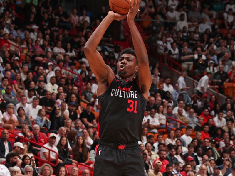 MIAMI, FL - MARCH 5: Thomas Bryant #31 of the Miami Heat three point basket during the game against the Detroit Pistons on March 5, 2024 at Kaseya Center in Miami, Florida. NOTE TO USER: User expressly acknowledges and agrees that, by downloading and or using this Photograph, user is consenting to the terms and conditions of the Getty Images License Agreement. Mandatory Copyright Notice: Copyright 2024 NBAE (Photo by Issac Baldizon/NBAE via Getty Images)