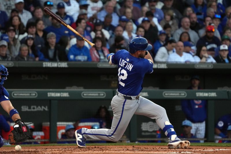 Mar 6, 2025; Mesa, Arizona, USA; Kansas City Royals second base Nick Loftin (12) loses his bat in the second inning against the Chicago Cubs at Sloan Park. Mandatory Credit: Rick Scuteri-Imagn Images