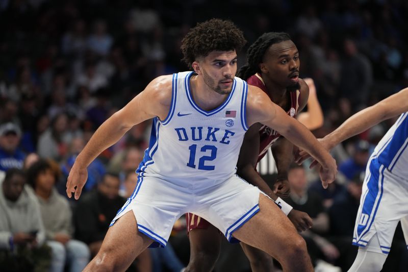 Mar 12, 2026; Charlotte, NC, USA; Duke Blue Devils forward Cameron Boozer (12) under the basket in the first half at Spectrum Center. Mandatory Credit: Bob Donnan-Imagn Images