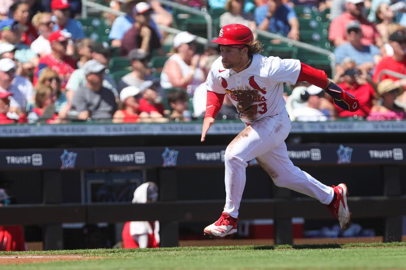 Mar 11, 2024; Jupiter, Florida, USA; St. Louis Cardinals second baseman Brendan Donovan (33) runs toward home plate against the Washington Nationals during the second inning at Roger Dean Chevrolet Stadium. Mandatory Credit: Sam Navarro-USA TODAY Sports