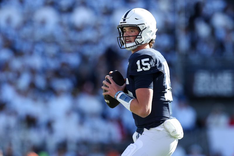 Nov 2, 2024; University Park, Pennsylvania, USA; Penn State Nittany Lions quarterback Drew Allar (15) looks to throw a pass during the first quarter against the Ohio State Buckeyes at Beaver Stadium. Mandatory Credit: Matthew O'Haren-Imagn Images