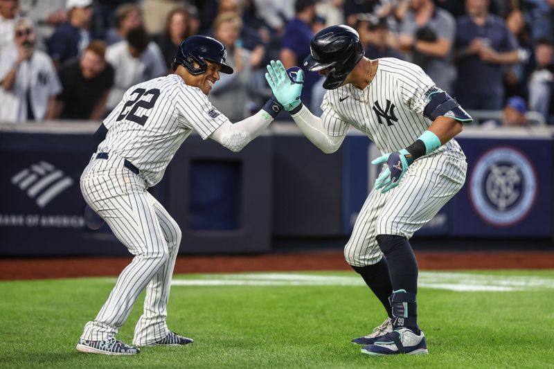 Aug 21, 2024; Bronx, New York, USA;  New York Yankees center fielder Aaron Judge (99) celebrates with right fielder Juan Soto (22) after hitting a two run home run in the third inning against the Cleveland Guardians at Yankee Stadium. Mandatory Credit: Wendell Cruz-USA TODAY Sports