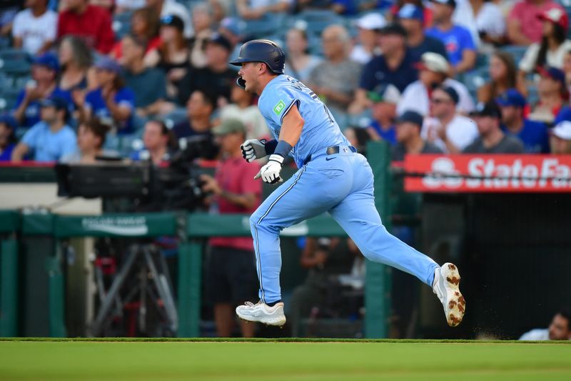 Aug 12, 2024; Anaheim, California, USA; Toronto Blue Jays second baseman Will Wagner (7) runs after hitting a double in his major league debut against the Los Angeles Angels during the second inning at Angel Stadium. Mandatory Credit: Gary A. Vasquez-USA TODAY Sports