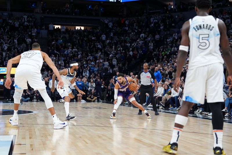 MINNEAPOLIS, MN -  NOVEMBER 17: Tyus Jones #21 of the Phoenix Suns handles the ball during the game against the Minnesota Timberwolves on November 17, 2024 at Target Center in Minneapolis, Minnesota. NOTE TO USER: User expressly acknowledges and agrees that, by downloading and or using this Photograph, user is consenting to the terms and conditions of the Getty Images License Agreement. Mandatory Copyright Notice: Copyright 2024 NBAE (Photo by Jordan Johnson/NBAE via Getty Images)