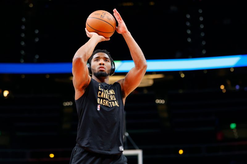 ATLANTA, GEORGIA - JANUARY 20: Donovan Mitchell #45 of the Cleveland Cavaliers warms up before a game against the Atlanta Hawk sat State Farm Arena on January 20, 2024 in Atlanta, Georgia. NOTE TO USER: User expressly acknowledges and agrees that, by downloading and or using this photograph, User is consenting to the terms and conditions of the Getty Images License Agreement. (Photo by Alex Slitz/Getty Images)