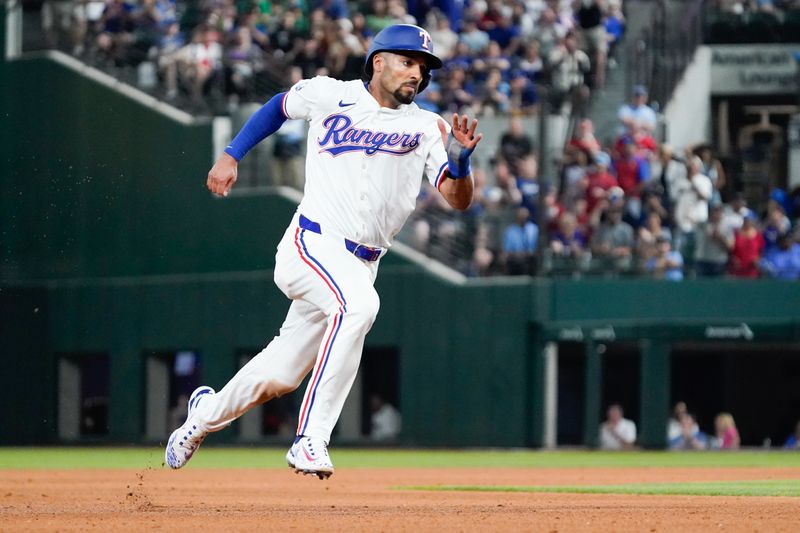 May 18, 2024; Arlington, Texas, USA; Texas Rangers second baseman Marcus Semien (2) runs to the third base during the eighth inning against the Los Angeles Angels at Globe Life Field. Mandatory Credit: Raymond Carlin III-USA TODAY Sports